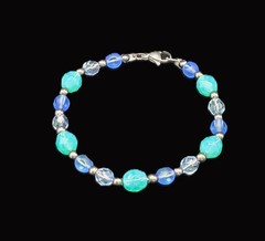 Uranium tri-color blue glass bead 7″ bracelet on a silver tone snake chain 7″