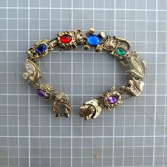 Vintage Sliding 9 Charm Bracelet 6 3/8”L Jeweled and Figural Unbranded