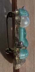 Vintage Jomaz palm tree Buddha brooch