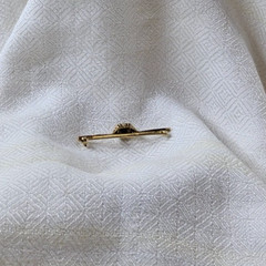 Blue stone gold tone bar Brooch
