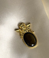 Vintage 1990s Gold Tone Angel Pendant with Deep Green Cabochon – 1.25 x 0.9 Inch