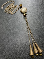 Vintage 28” Metallic Gold Faceted Beaded Chain Tassel Charm Necklace