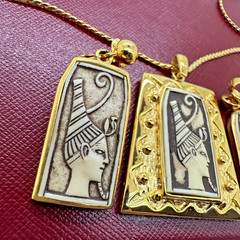 SET OF VINTAGE CELEBRITY GOLD TONE EGYPTIAN MOTIF PENDANT NECKLACE & EARRINGS