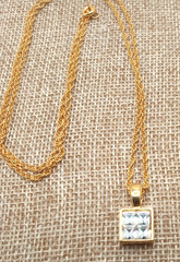 Vtg Givenchy Gold Tone Sm Pendant Channel Set Cubic Zirconia Reverse Side Logo