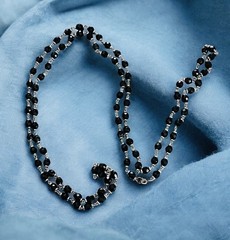 58” Black Faceted Glass Bead Sautoir Necklace – Silvertone Spacers – Spring Ring