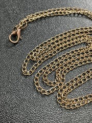 Vintage 28” Metallic Gold Faceted Beaded Chain Tassel Charm Necklace