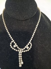 vintage 1950’s silver tone rhinestone dangle bow Tie necklace