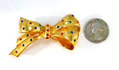 Vintage Signed CORO Bow Brooch Flush Set Jewel Tone Rhinestones Gold Plated Pin