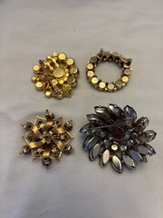 Set a four mid-century small brooches. Some serious costume bling here.