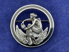 art nouveau style sterling silver pin woman and bird 1 5/8” diaameter