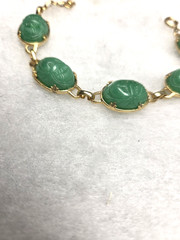 Vtg gold tone green lucite carved Scarab Bracelet