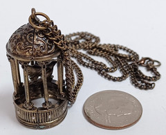 Brass Tone Bird in Cage Pendant Necklace 32″ Chain Vintage Style