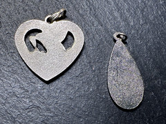 8 UNIQUE VINTAGE SILVER TONE PENDANTS D595