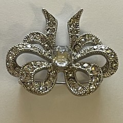 Vintage Monet Clear Rhinestones Bow Brooch Silver Tone Emerald Cut Center Stone