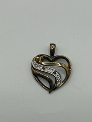 Vintage Sterling 925 silver heart shaped pendant with heart Cz Sapphires