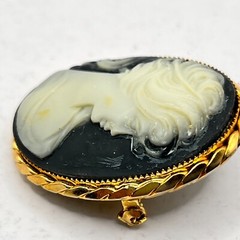 Gold Tone Cameo Brooch Oval Blue background – 1 5/8″ x 1 3/8″