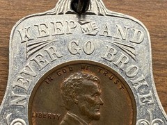 VINTAGE BELL SHAPED “GOOD LUCK/NEVER GO BROKE” PENDANT W/1930 PENNY