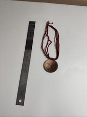 Antique copper red enamel sun flower medallion cord necklace