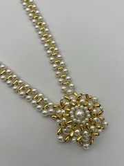 Vintage Necklace Of Gold-tone Beads With Faux Pearls And A Snowflake Pendant