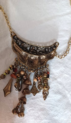 Bohemian dark metal aesthetic colorful beads with metal charms and dangles