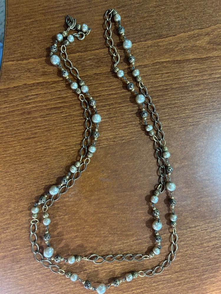 Vintage long necklace with irregular pearls and ornate metal beads gold toned