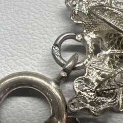 Antique Silver Bracelet featuring Finely detailed Filigree Flowers