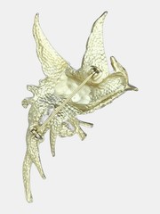 This elegant vintage-style gold-tone bird brooch 3” long by 1.5” wide