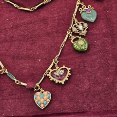 Vintage Joan Rivers Hearts and Flowers 26″ Gold Tone Necklace 19 Charms IOB