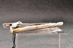 Near mint, gold and Cufflinks and silver tie clip, “Yves Saint Laurent”, case.