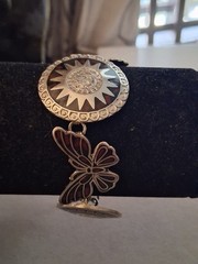 Mexican alpaca silvertone butterfly & Aztec sun medallion bracelet. 7″
