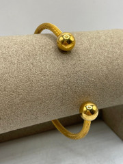 VTG Gold-tone twisted cable ball tip bangle bracelet