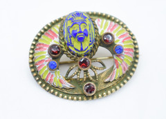 Antique Egyptian Revival winged scarab brooch featuring vibrant enamel work