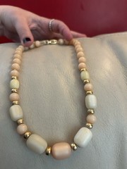 1980s Napier Pale Orange and Cream Lucite with Gold spacers Necklace.