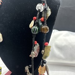 Vtg Indian Glass Beads Stone Nuggets and Seven Puffed Animals Cord Necklace.Read