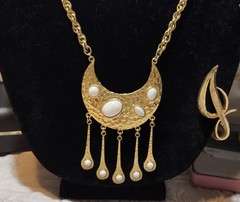 Vintage gold-toned necklace Crescent moon pendant with a hammered finish.