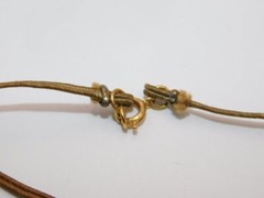 B595-VINTAGE NECKLACE~LUCITE AMBER BEADS/CORDED~26″