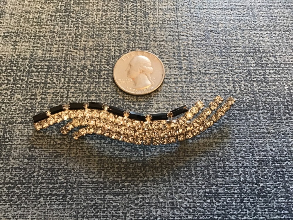 vintage rhinestone and jet black Art Deco swoop brooch 3 1/2”