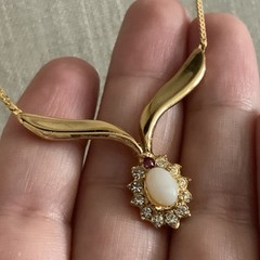 Vintage man made low grade opal and garnet v necklace in gold tone