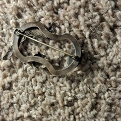 lot of pin, belt buckel and watches