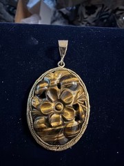 Gold Colored Carved Tiger Eye Pendant .2 X 2.6 Cm