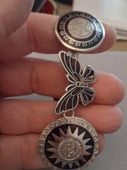 Mexican alpaca silvertone butterfly & Aztec sun medallion bracelet. 7″