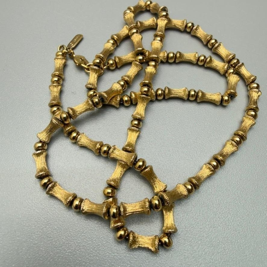 Vintage Monet Gold Tone Bamboo Bead Necklace 26″ Long Signed Textured MCM Chic