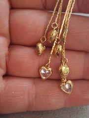 Puffy hearts & crystal bezel-set heart tassel earrings, multi chain, cascading