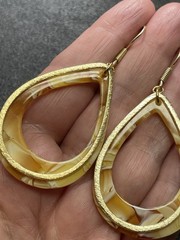 Vintage 2.5” Orange Marbled Lucite Good Tone Metal Dangle Earrings