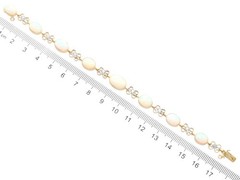 9.50Ct White Opal and 0.24Ct Diamond 15k Yellow Gold Necklace / Bracelet Set