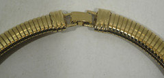 AVON 1886-1986 Gold Tone Omega Rhinestone Choker Necklace 100th Anniversary VTG