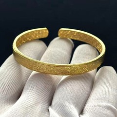 Golden Cuff Bangle Bracelet Gold-wash (NOT SURE) marked ‘999’, 7.5 in adjustable