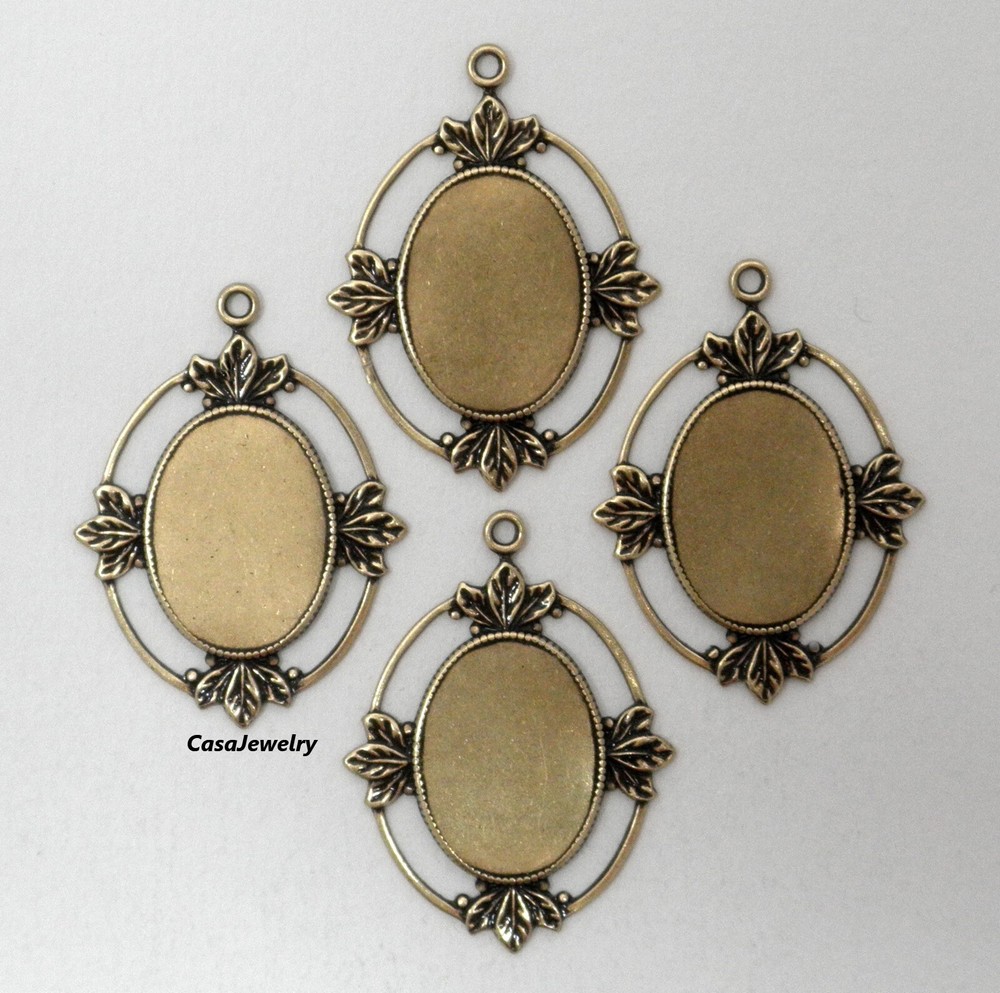 #1160 ANTIQUED GOLD ART NOUVEAU 18x13MM BEZEL W/TOP HANG RING – 4 Pc Lot