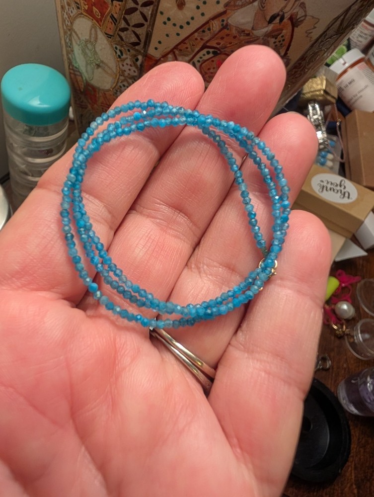 17″ 2.5 mm Neon Apatite bead necklace with 14 k gold clasp