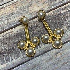 Pierced faux pearl cabochon dangle earrings in gold tone metal